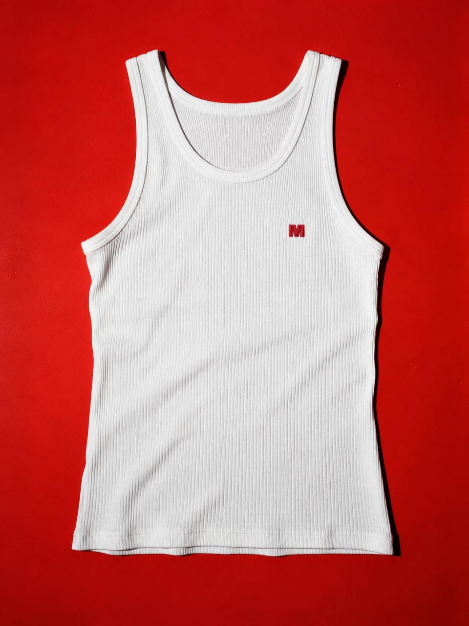 The Marcelleke laid flat on red
